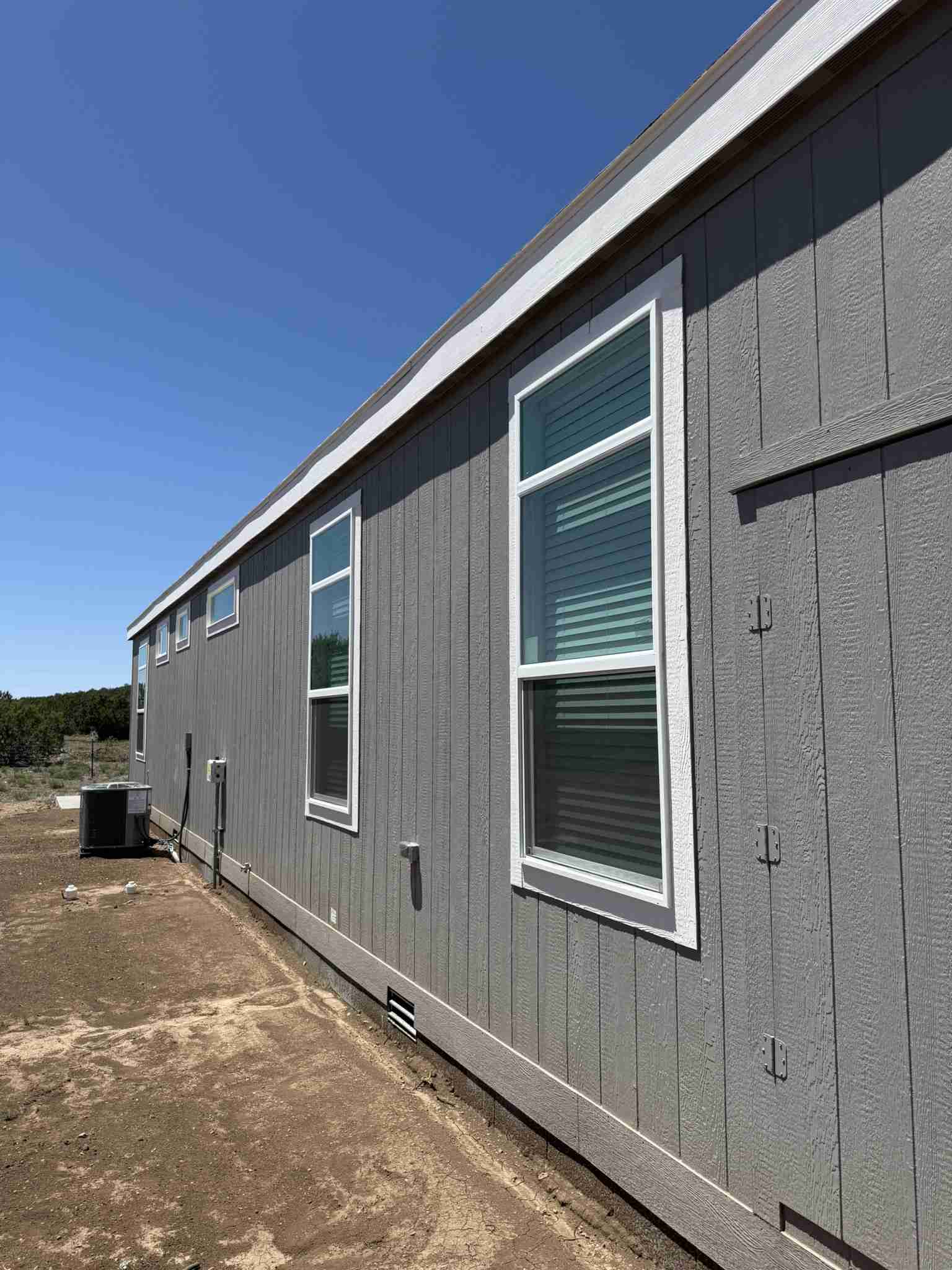 Seamless Steel Gutter Installation With Metal Building Panel Modification in Williams, AZ